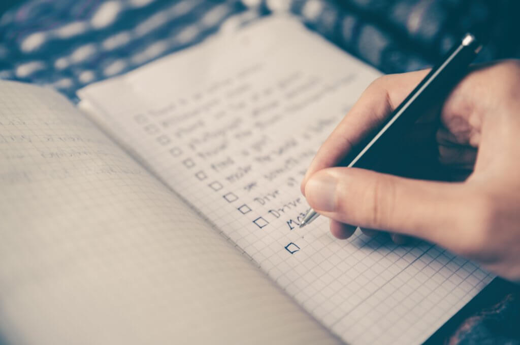 Person checking things off their to-do list