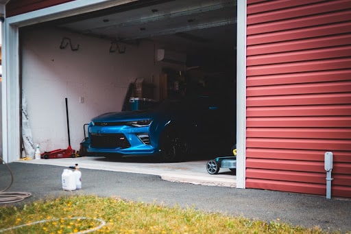 car sitting in open garage